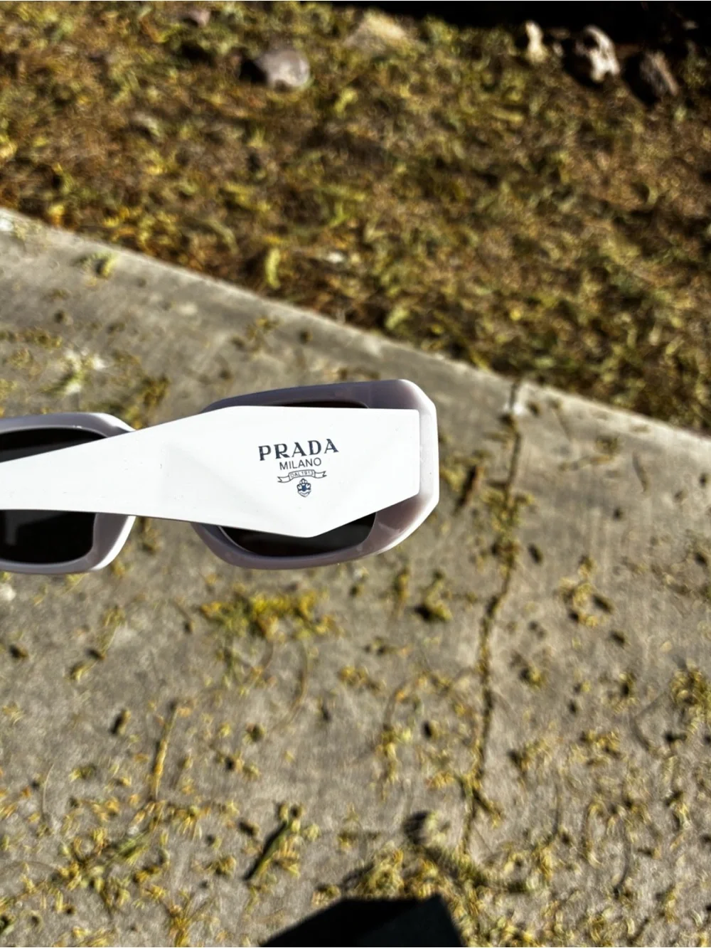 Prada White Frame Sunglasses with Black Lenses